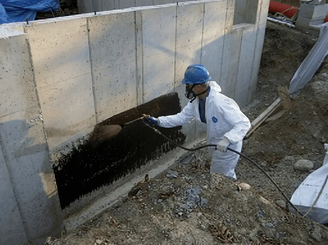 Professional waterproofing the exterior walls of the basement in Atlanta, GA