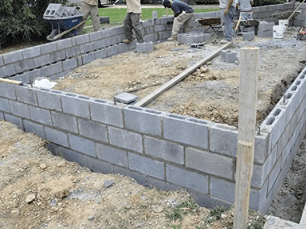 Professionals building a foundation with blocks in Atlanta, GA
