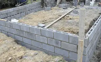 Professionals building a foundation with blocks in Atlanta, GA