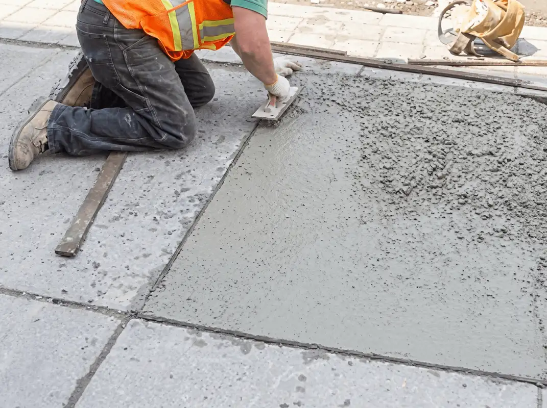 Professional repairing a concrete floor in Atlanta, GA